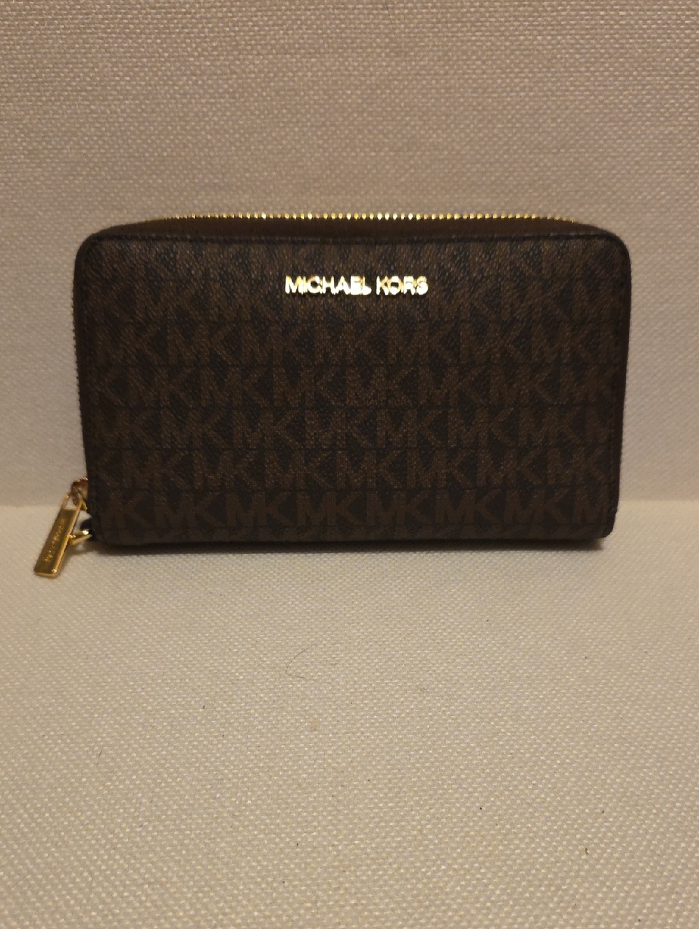 Gently Used Michael Kors Brown and Gold Logo Zip Around Wallet/Phone Case